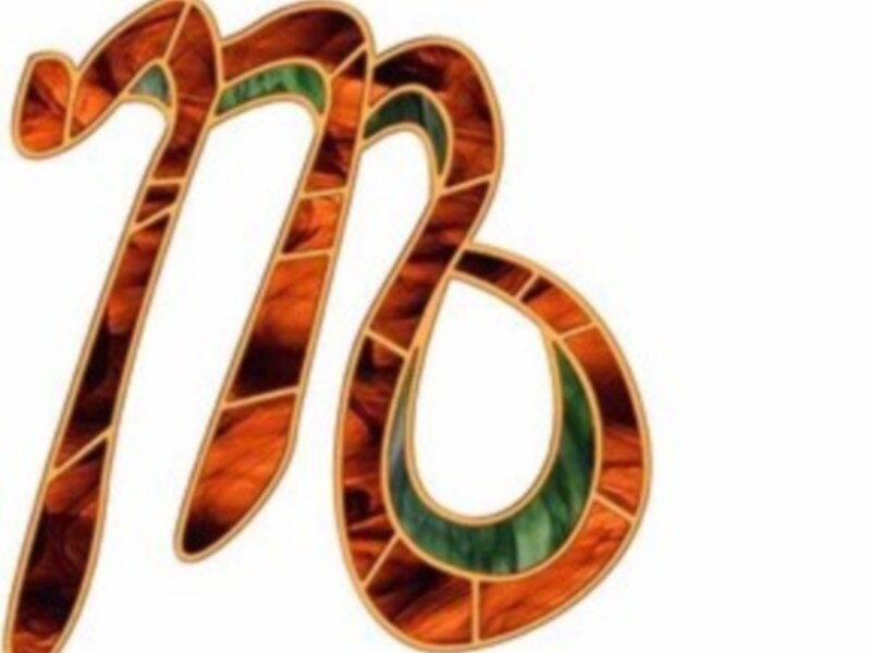 Símbolo del signo zodiacal de Virgo con un diseño artístico de colores y formas abstractas.