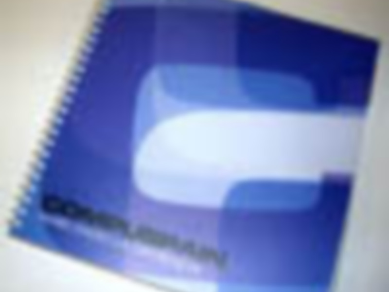 Portada de un cuaderno con diseño abstracto en tonos azules y blancos.