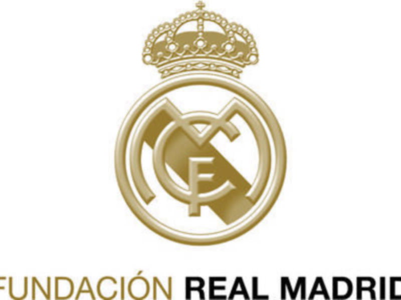 Logo de la Fundación Real Madrid en dorado, con la corona y las iniciales RMCF.