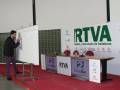 Presentación en un evento de RTVA, Radio y Televisión de Andalucía, con panelistas en el fondo.