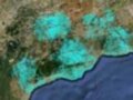 Vista satelital de la costa de España, mostrando áreas urbanas y terrestres en verde y azul claro.