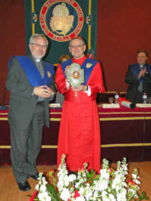 Ilustres Becario de Honor y de la visita extraordinaria a Sevilla de S.E.R. Cardenal Ángelo Amato (SDB), en el Colegio Mayor San Juan Bosco.