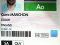 Una tarjeta identificativa de un entrenador llamado Curro Manchon, con la marca del Comité Olímpico Internacional y el número de identificación 1018407-02.
