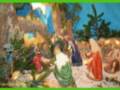 Representación escultórica de la Natividad con figuras en trajes tradicionales y árboles de navidad alrededor.