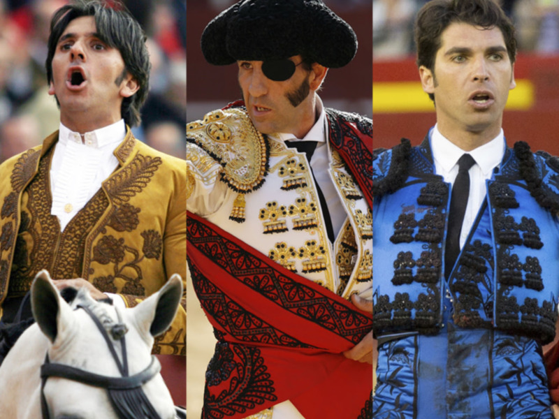 Tres matadores de toros en trajes de lujo y mantillas, representativos de la tradición taurina española.