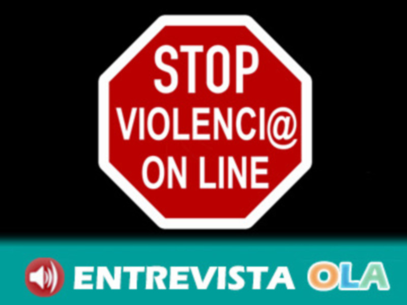 Señal de stop con mensaje 'Stop Violenci@ On Line' sobre fondo negro, destacada por logo 'Entrevist@ OLA' en la parte inferior.