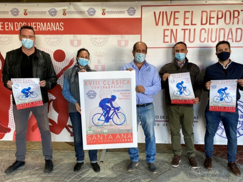 Presentación de la XVIII Clásica Contrarreloj en Dos Hermanas, con la participación de varios organizadores y promotores del evento.
