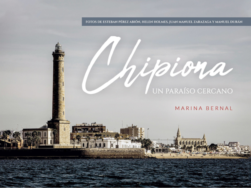 Chipiona, un paraíso cercano. Lighthouse and coastal cityscape.