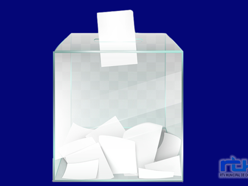 Un cajón de votación lleno de papeletas, simbolizando el proceso electoral. En el fondo, un fondo azul oscuro para enfatizar la importancia de la elección. La imagen representa la participación ciudadana en la elección política.
