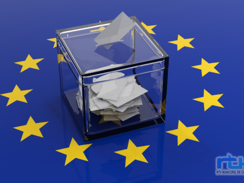 Urna electoral sobre fondo de bandera de la Unión Europea.