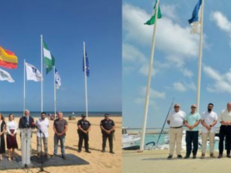 Celebración de banderas en la playa con autoridades y personal de servicios marítimos.