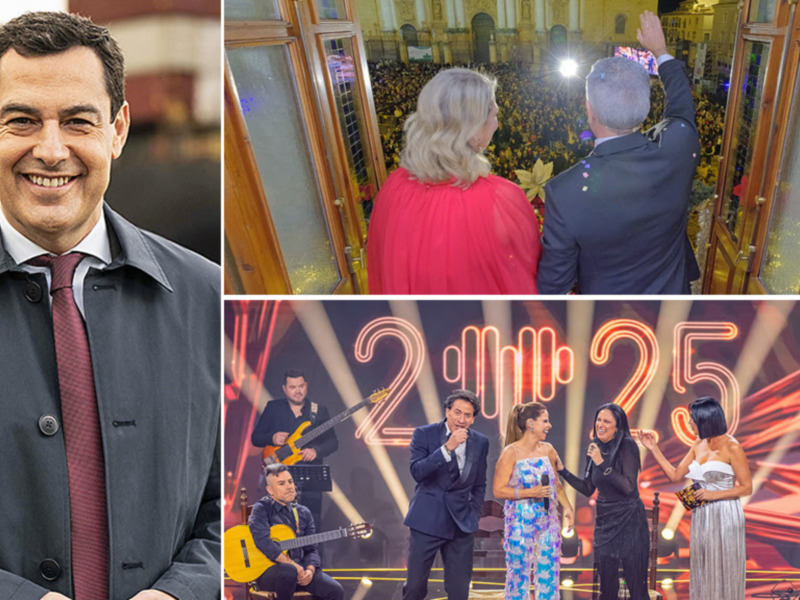 Una celebración festiva con una gran multitud en el fondo, un hombre en un traje sonriendo, y un grupo de personas en un escenario con luces brillantes.