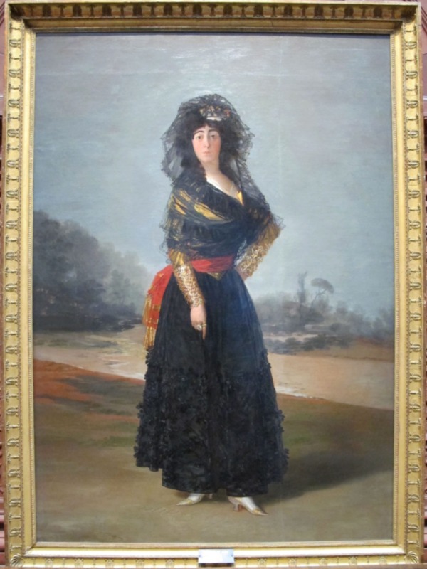 Retrato de dama con vestido negro y mantilla, pintura histórica enmarcada.